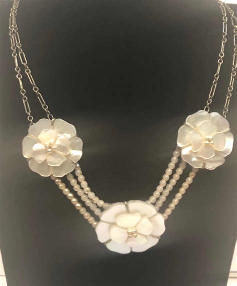 chanel pearl crystal flower necklace.